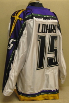 Worn during the 05-06 season by Kevin Lohry. This #15 jersey  was worn by Sioux City native shows lots of wear. Kevin started his hockey career in the Sioux City Youth program and played all through high school. Kevin split his senior year between the Metros and Musketeers.  The following season, 2005-06, he would earn a full time spot on the Musketeer rooster and the next season, 2006-07, he would go on to be named alternate captain and, secure a scholarship at Princeton University.  All-Star Game Patch and NOB . Manufactured by OT Sports, this size 56 shows great wear. 